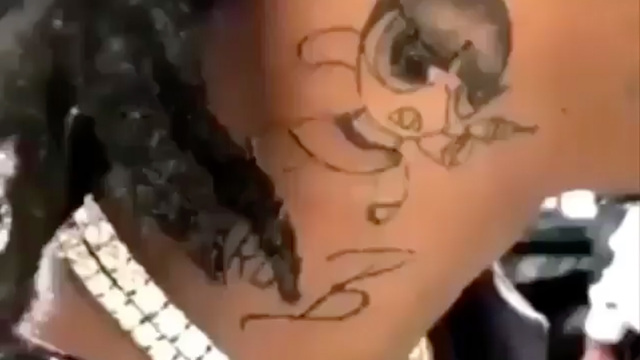 Cardi B Shows Off Peacock Hip Tattoo After 'Hours of Pain