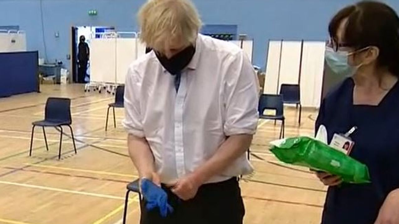 It S Like Oj Simpson Boris Johnson Jokes As He Struggles To Put On Gloves At Vaccination Centre Politics News Sky News