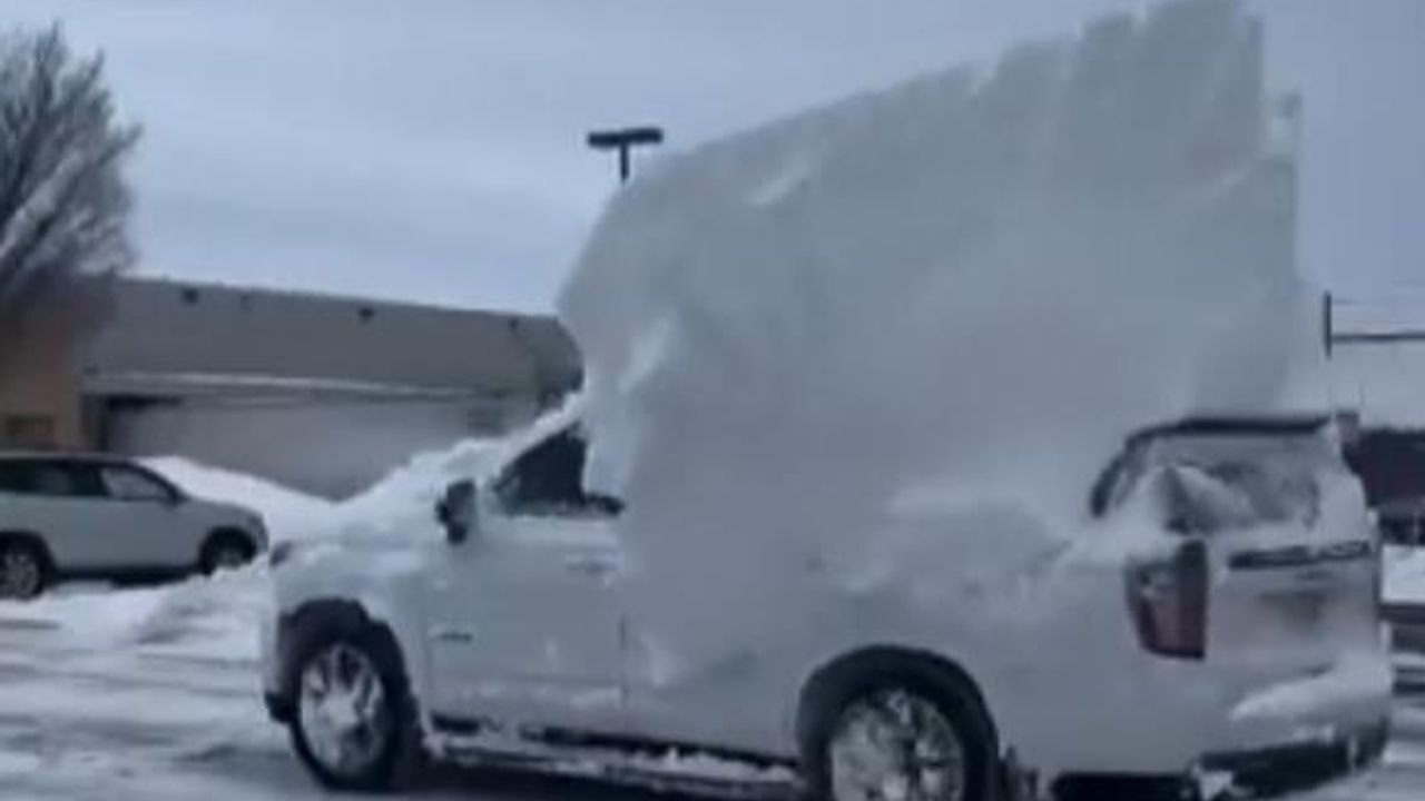 Bills players have to dig out their cars as they arrive back to find them  submerged in snow