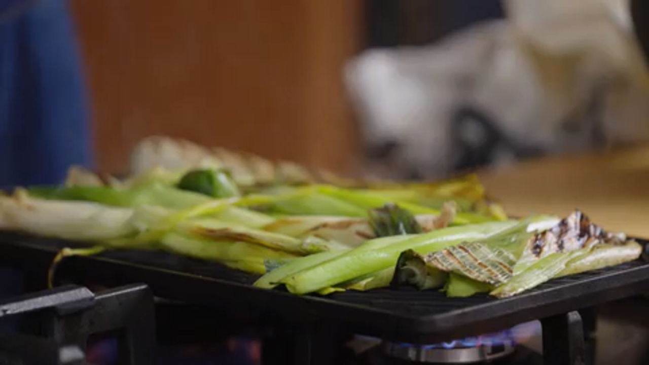 Griddled leeks with romesco and toasted hazelnuts