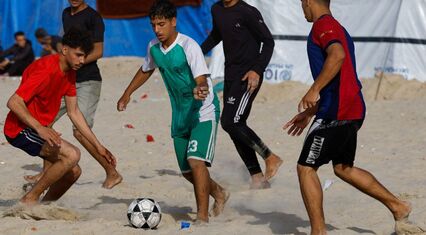 Gaza’s ‘World Cup’: Palestinians play barefoot football among rubble