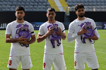 Iran’s football team honours children killed in Minab school airstrike