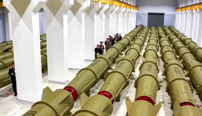 North Korea's Kim Jong Un inspects munitions at weapons factory