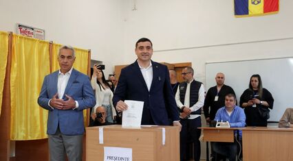 Exit polls show far-right Simion on top in Romania's presidential election