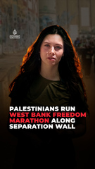 Palestinians run West Bank freedom marathon along separation wall