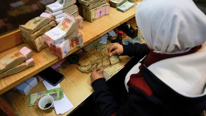 Syria pushes to lift banking sanctions, seeks global investment and recovery