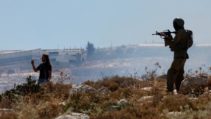 UN report: Israeli forces shield settlers during attacks on Palestinians