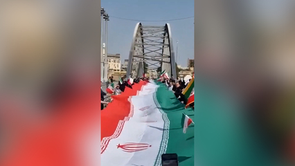 Iranians form human chains across bridges, at power plants