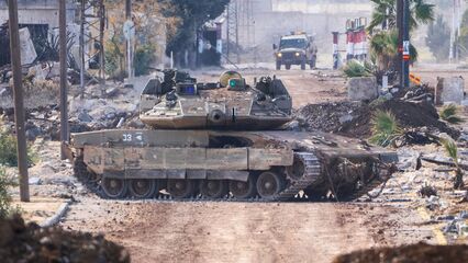 Israeli army vehicles enter village in southern Syria ahead of Paris talks