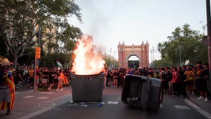 Police in Barcelona clash with Catalan national day activists
