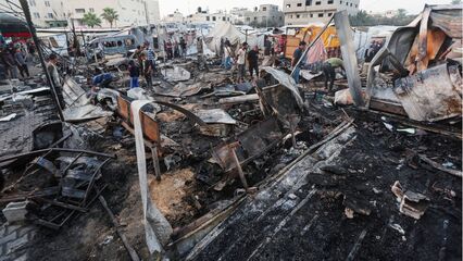 The aftermath of deadly Israeli strike on tent camp in Deir el-Balah