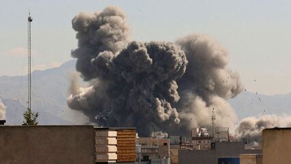 Plumes of smoke rise after Israel strikes ‘heart’ of Tehran