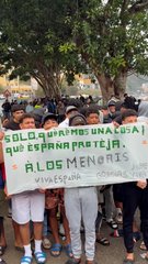 Migrant children protest after police clear beach camp in Ceuta
