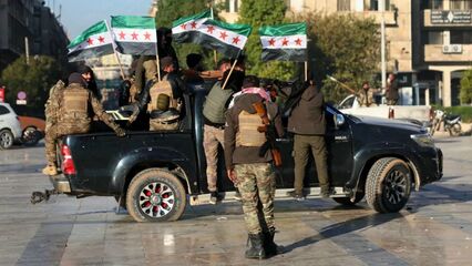 Civilians in Aleppo adjust to opposition control amid uncertainty and hope