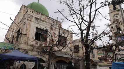 Israeli forces storm and set fire to historic mosque in Nablus amid West Bank raids
