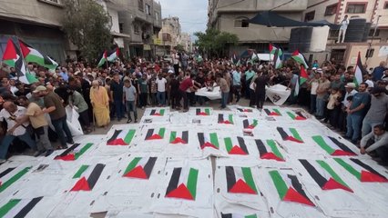 Mourners in Gaza bury remains of loved ones killed in 2023 Israeli strike