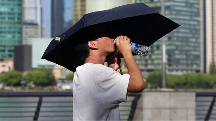East Asia heatwave: Scores of people dying of suspected heat stroke