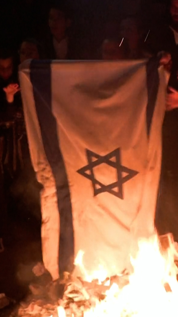 Ultra-Orthodox Jews burn Israeli flags to protest national day | Newsfeed |  Al Jazeera