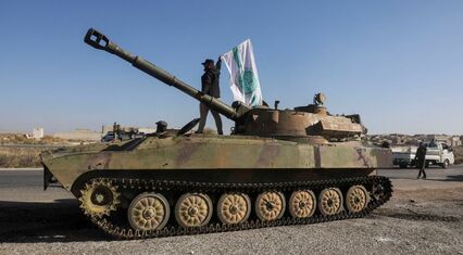 Syrian army withdraws from Hama as opposition forces enter key city