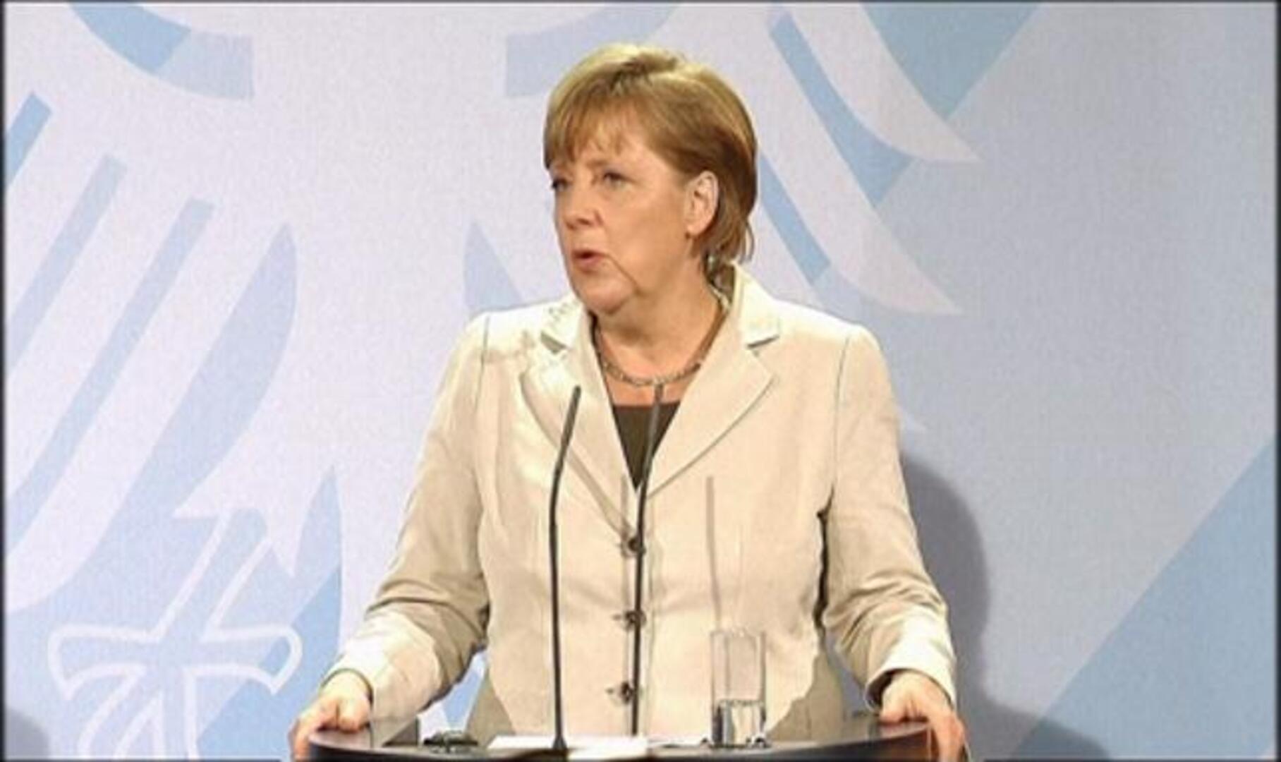 Merkel y Hollande defienden la permanencia de Grecia en el euro