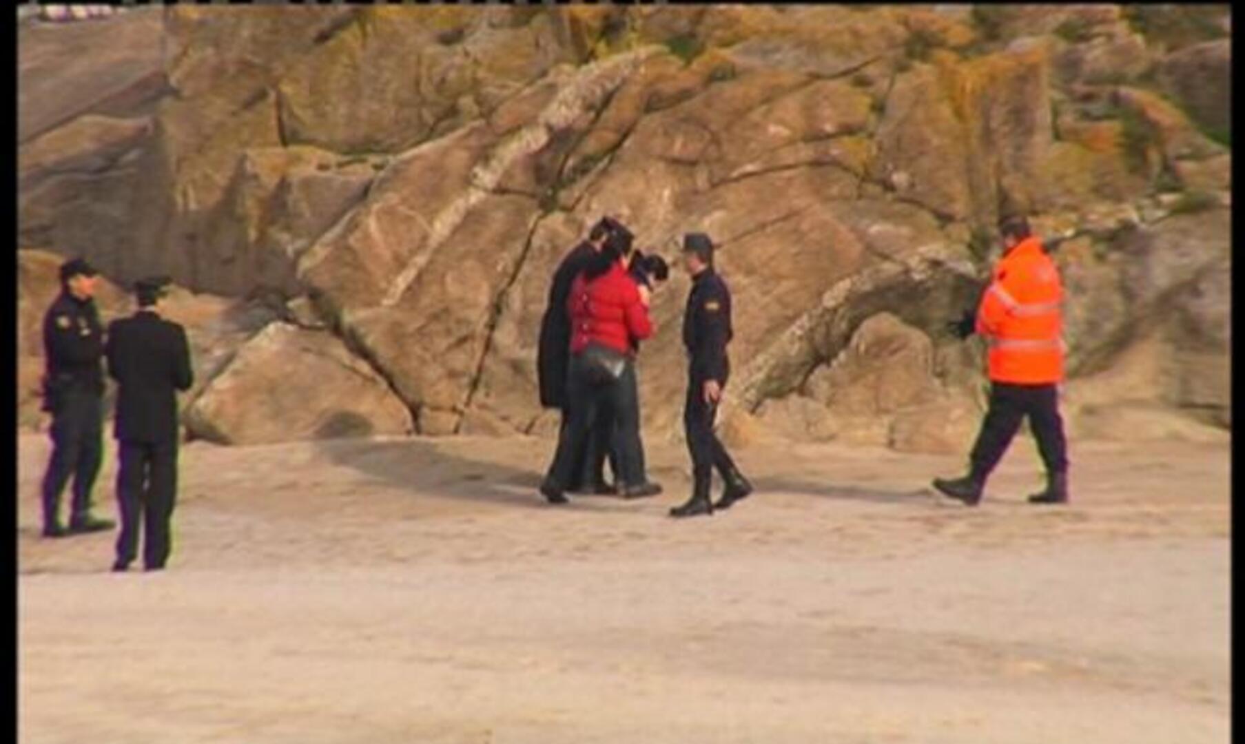 Buceadores localizan el cadavér del tercer policía engullido por el mar en La Coruña