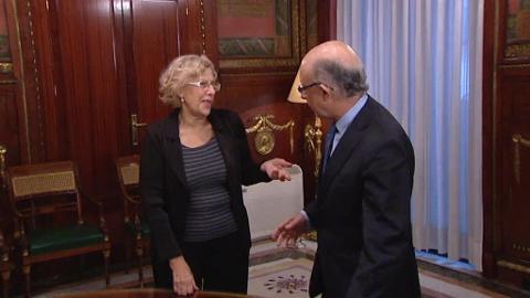Manuela Carmena y Cristóbal Montoro, durante su reunión