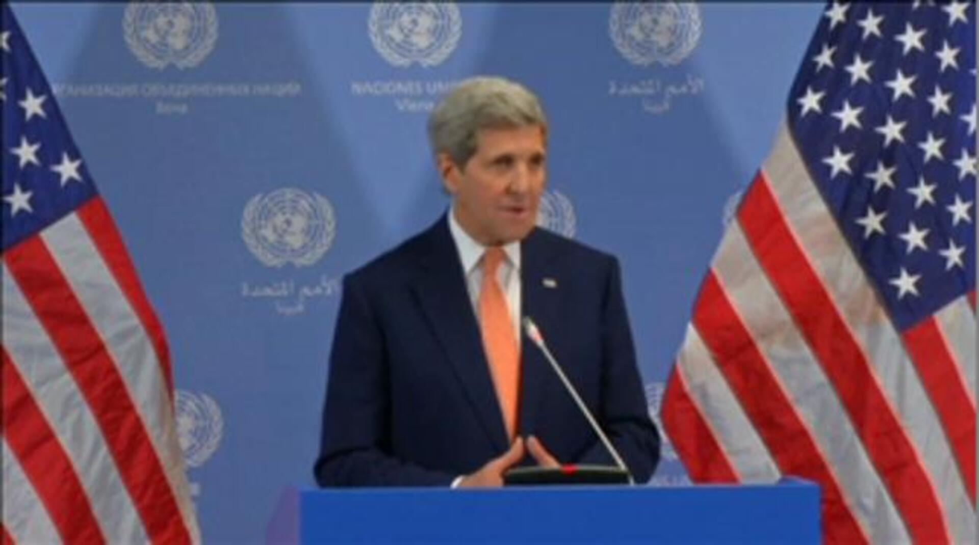 El secretario de Estado de EE.UU., John Kerry, con el primer ministro de Irán, Javad Zarif