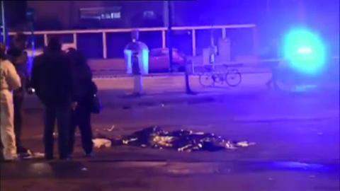 Un grupo de investigadores italianos rodean el cuerpo de Anis Amri