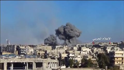 Varios cadáveres en una calle de Alepo